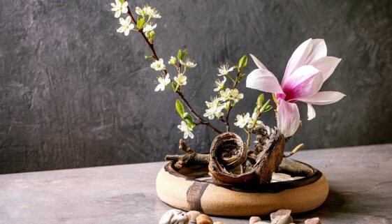 A photo of Ikebana flower arrangement on a table